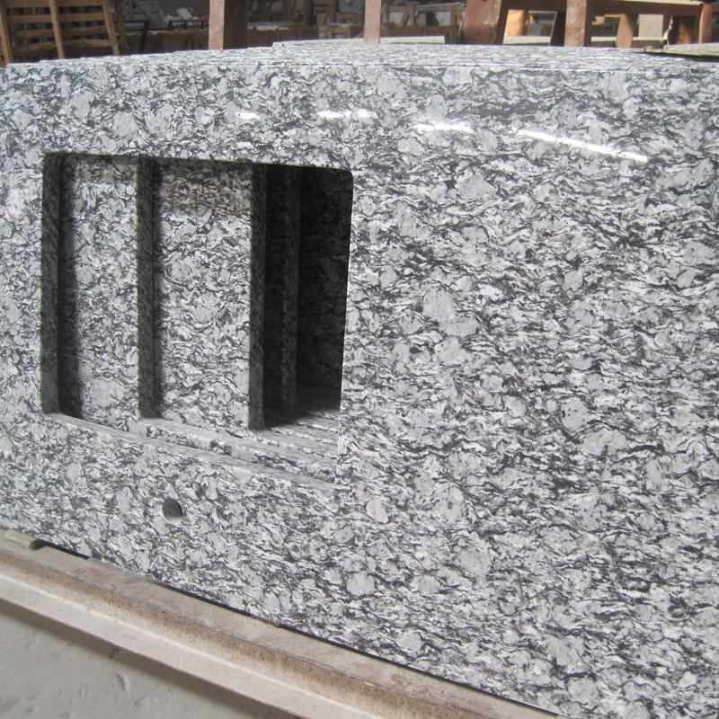 Spray White granite countertop