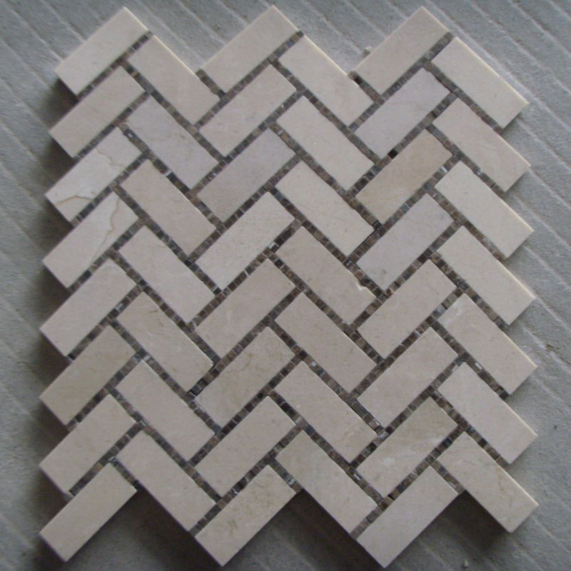 crema marfil and dark emperador marble herringbone tiles