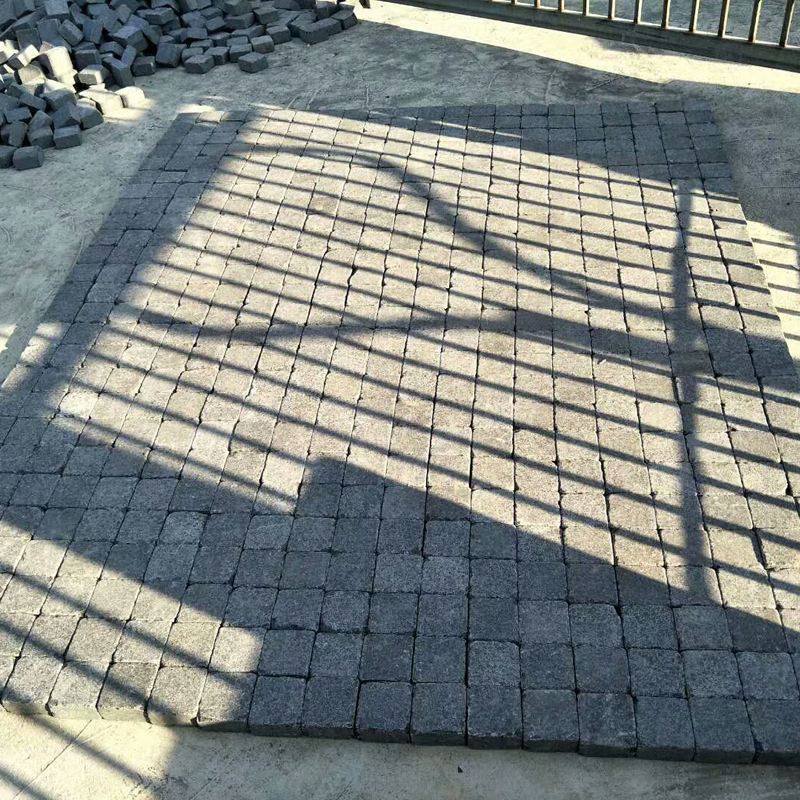 tumbled black g684 granite cobbles for deck